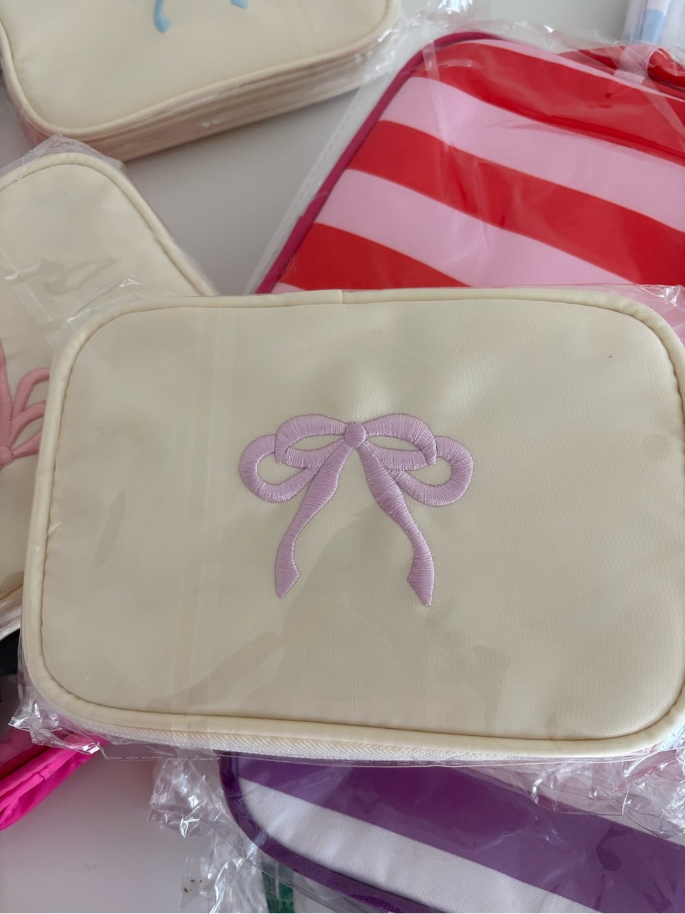 Cream Kids Bow Travel Pouch with Pink Embroidery